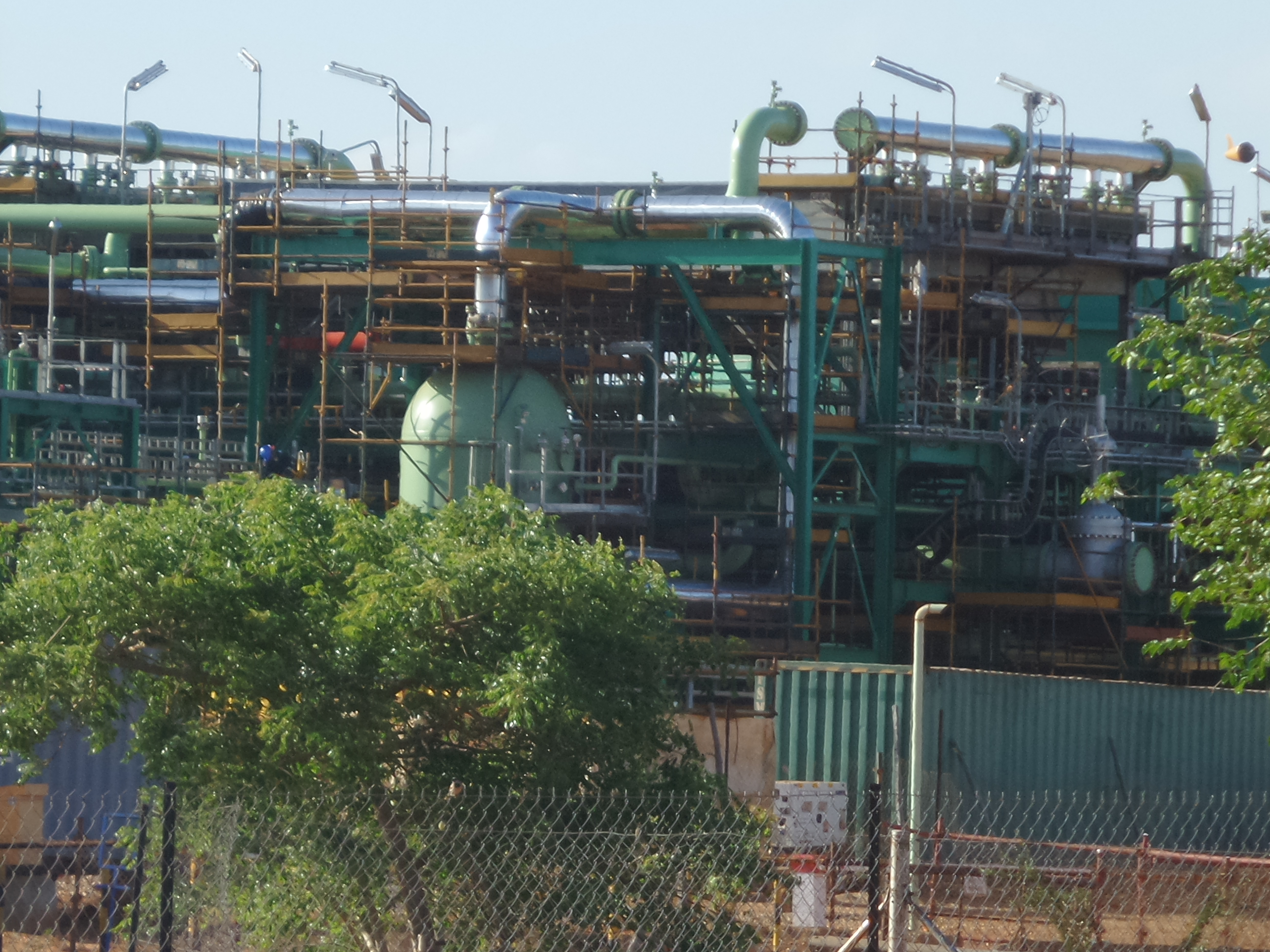 Scaffolding and sheeting around process equipment in Mozambique